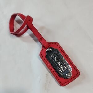 Coach hot pink leather and silver metal replacement purse hang tag charm. 